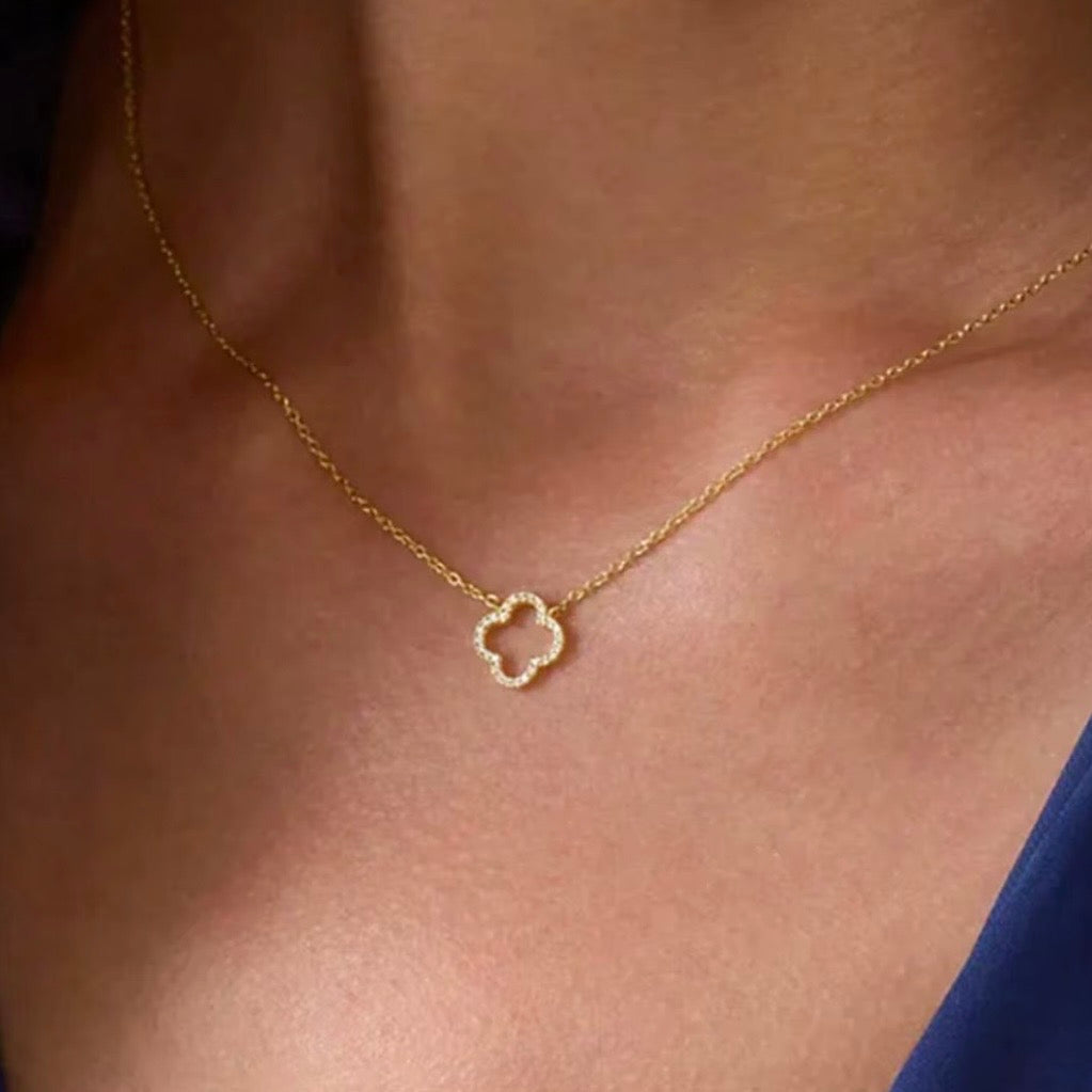 Hollowed out four leaf clover necklace