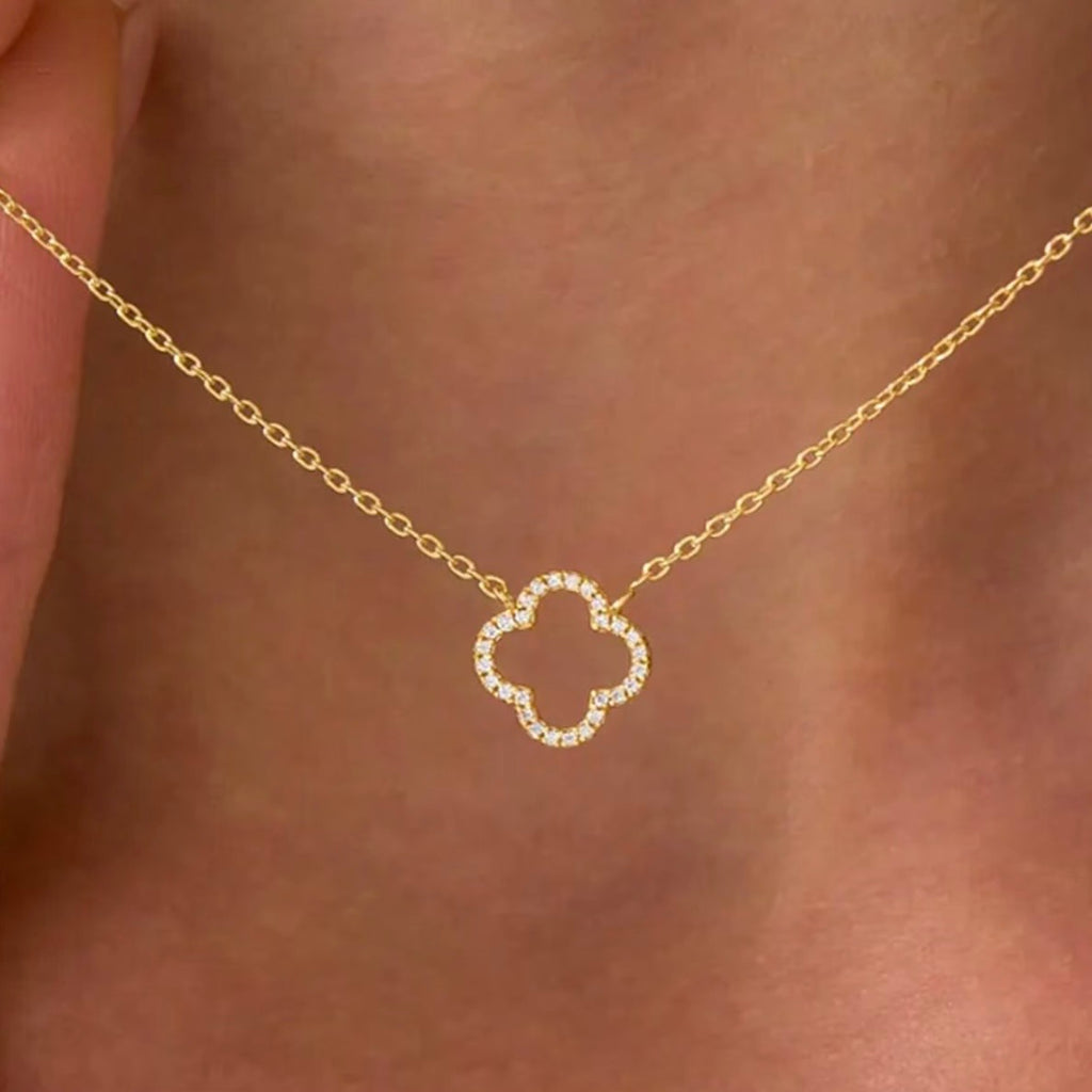 Hollowed out four leaf clover necklace